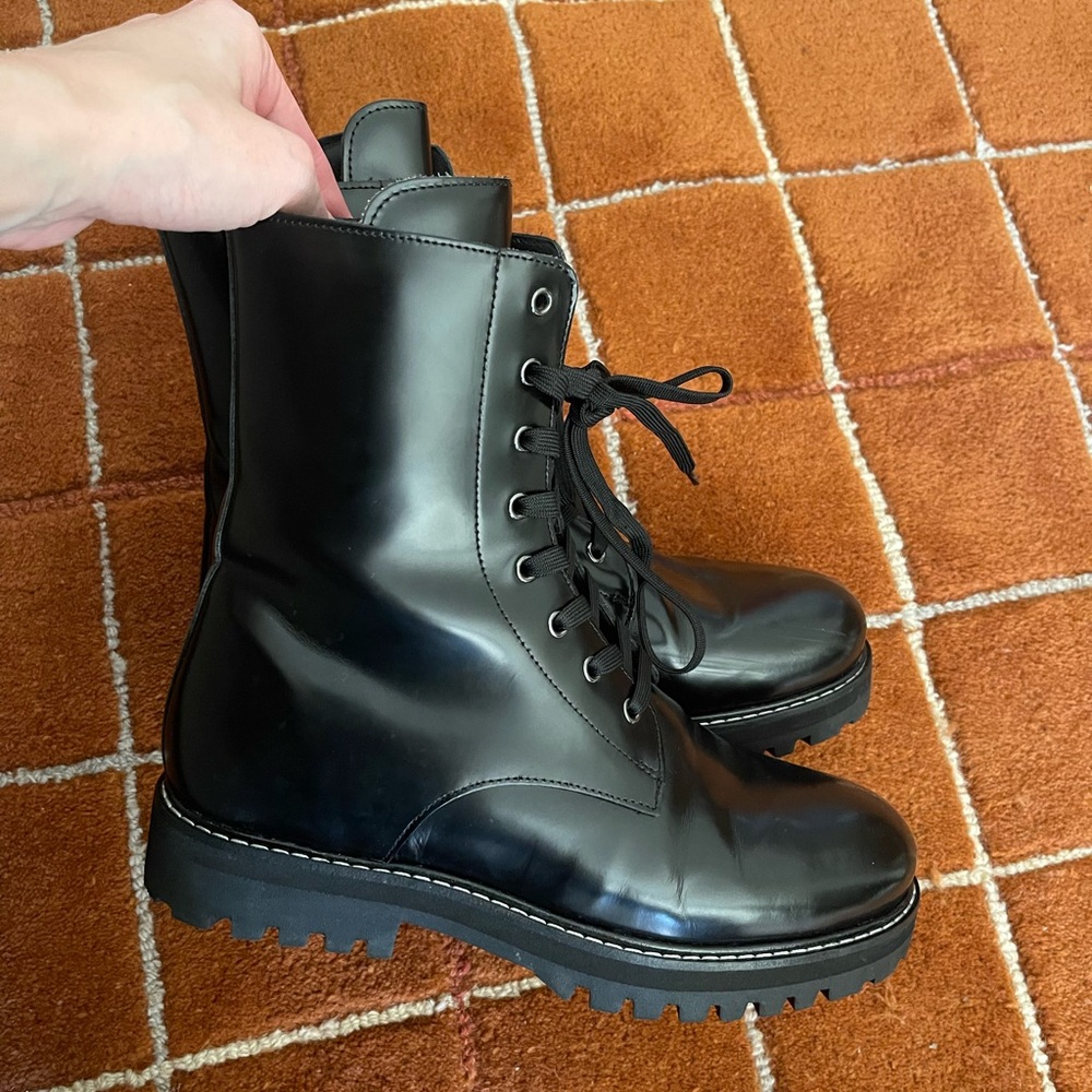 Thursday Combat Boots — black leather, white stitching — size 10